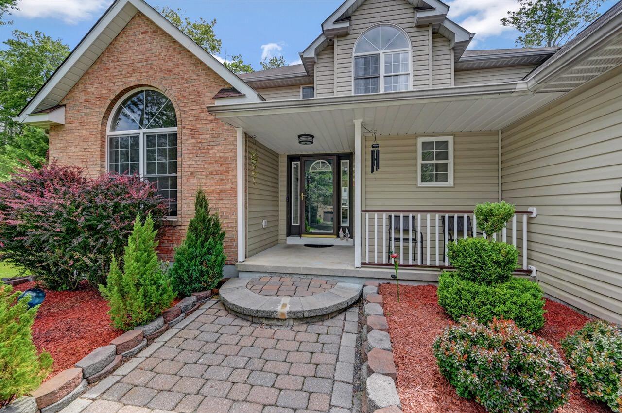Image 3: Covered Front Entry w/ Paver Walkway