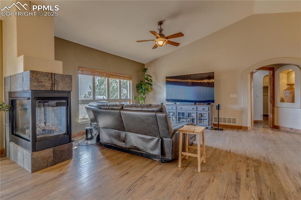 Image 4: Delightful design and cozy fireplace in this warm space.