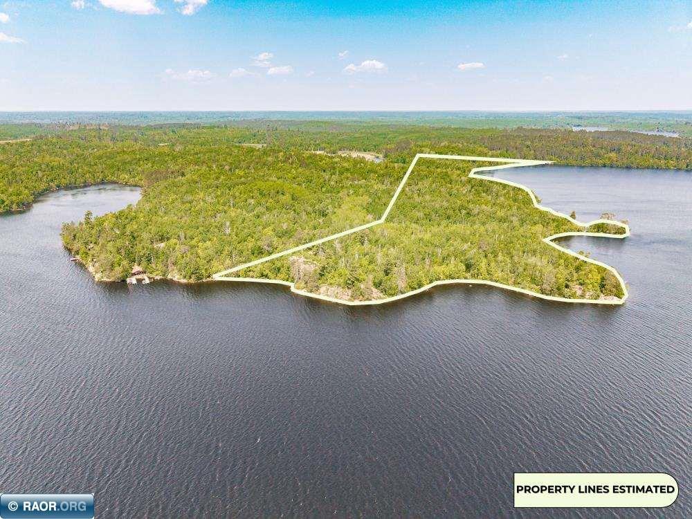 Image 2: Approximately 1 mile of shoreline and 60+ acres make up the estate property.