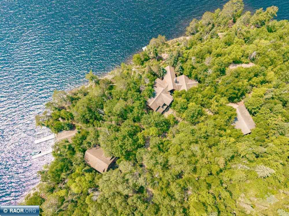 Image 4: Main cottage, garage behind, Guest cabin and docks