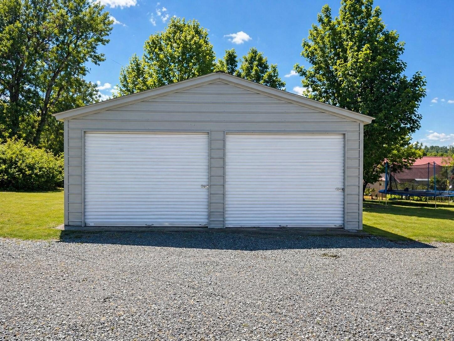 Image 4: MLS_Photo_06_AI_Garage_Straight_On