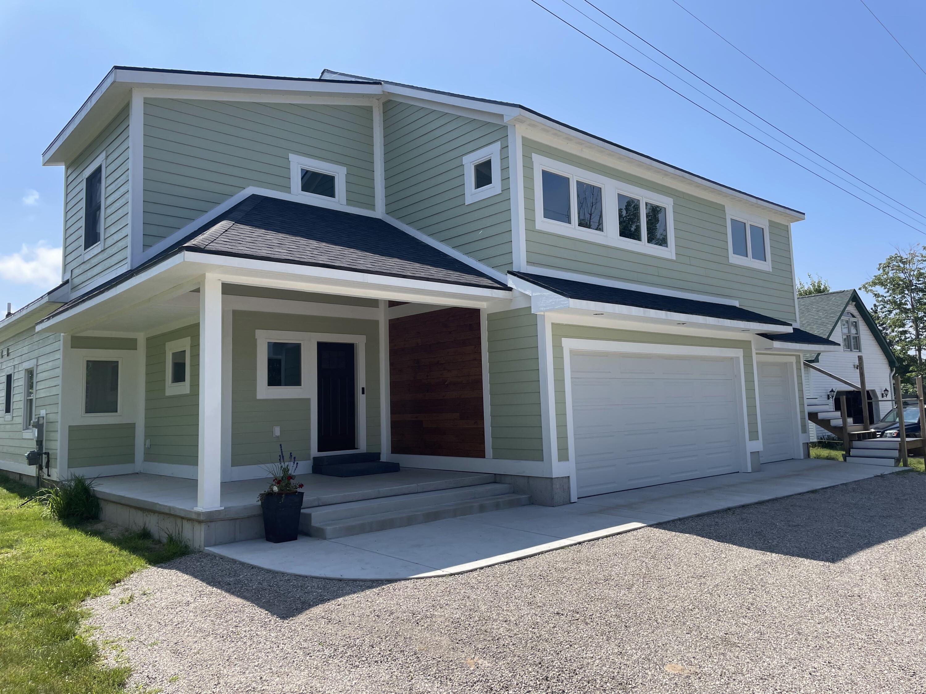 Image 1: Entry w/high ceiling & pine accents