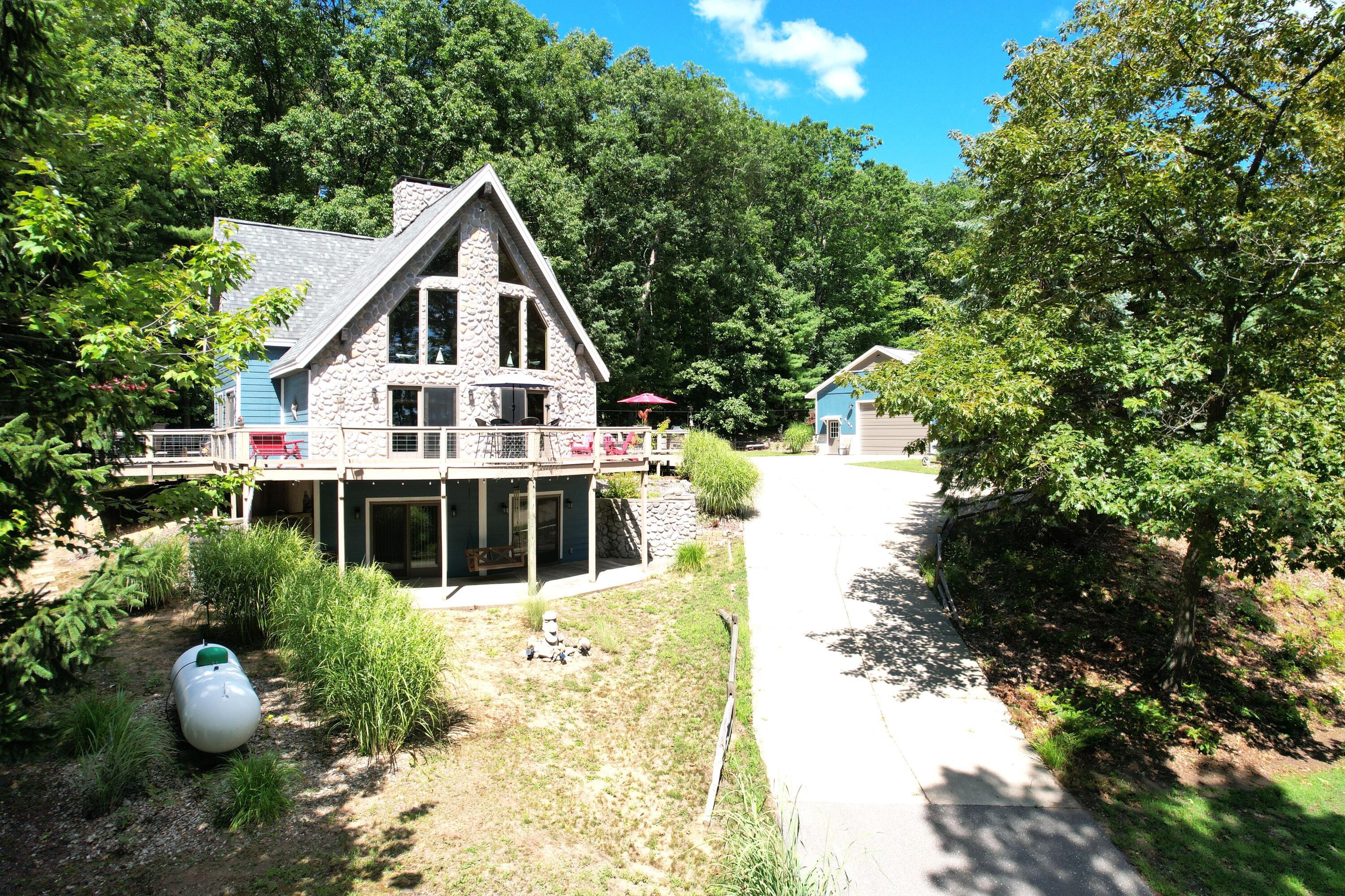Image 3: Paved Driveway to home & garage
