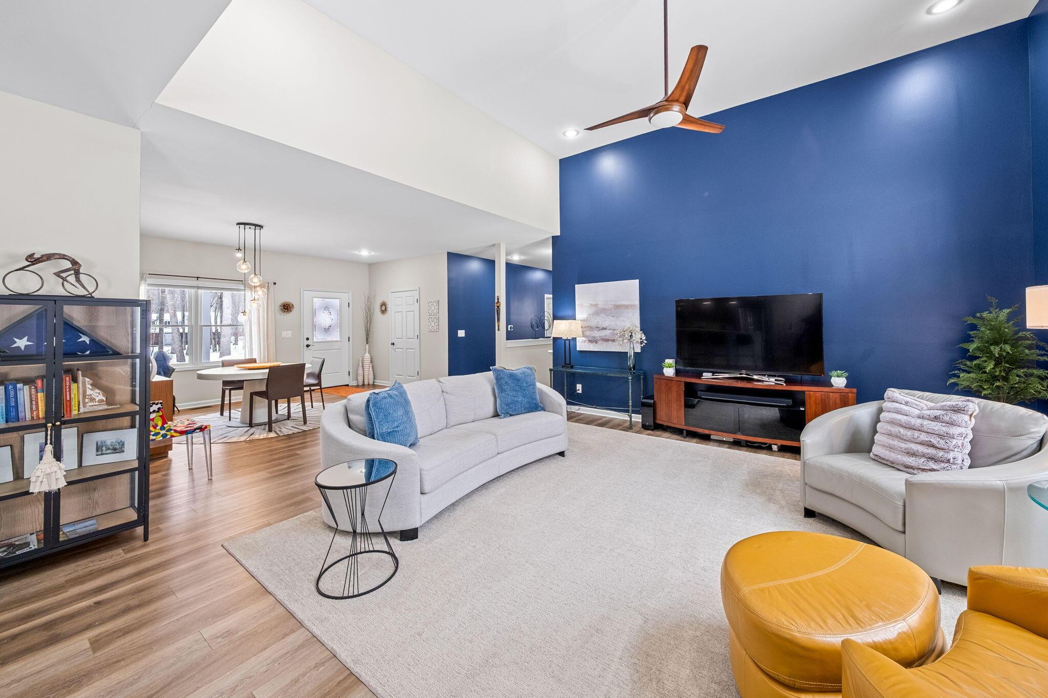 Image 4: open living room and dining room