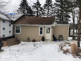 7033 WHITNEY WOODS Road