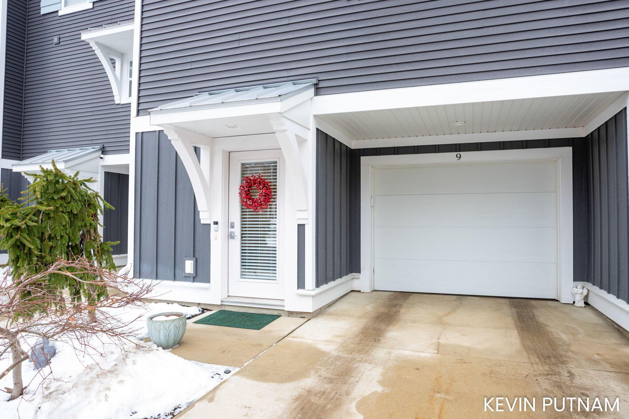 Image 4: Garage and Entry Door