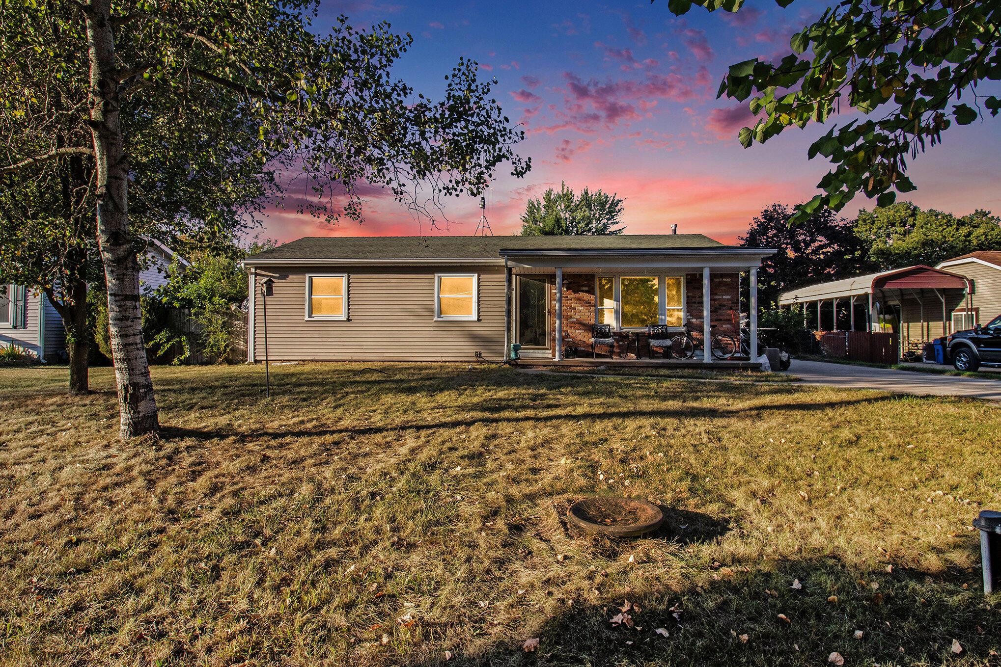 Image 1: front of house