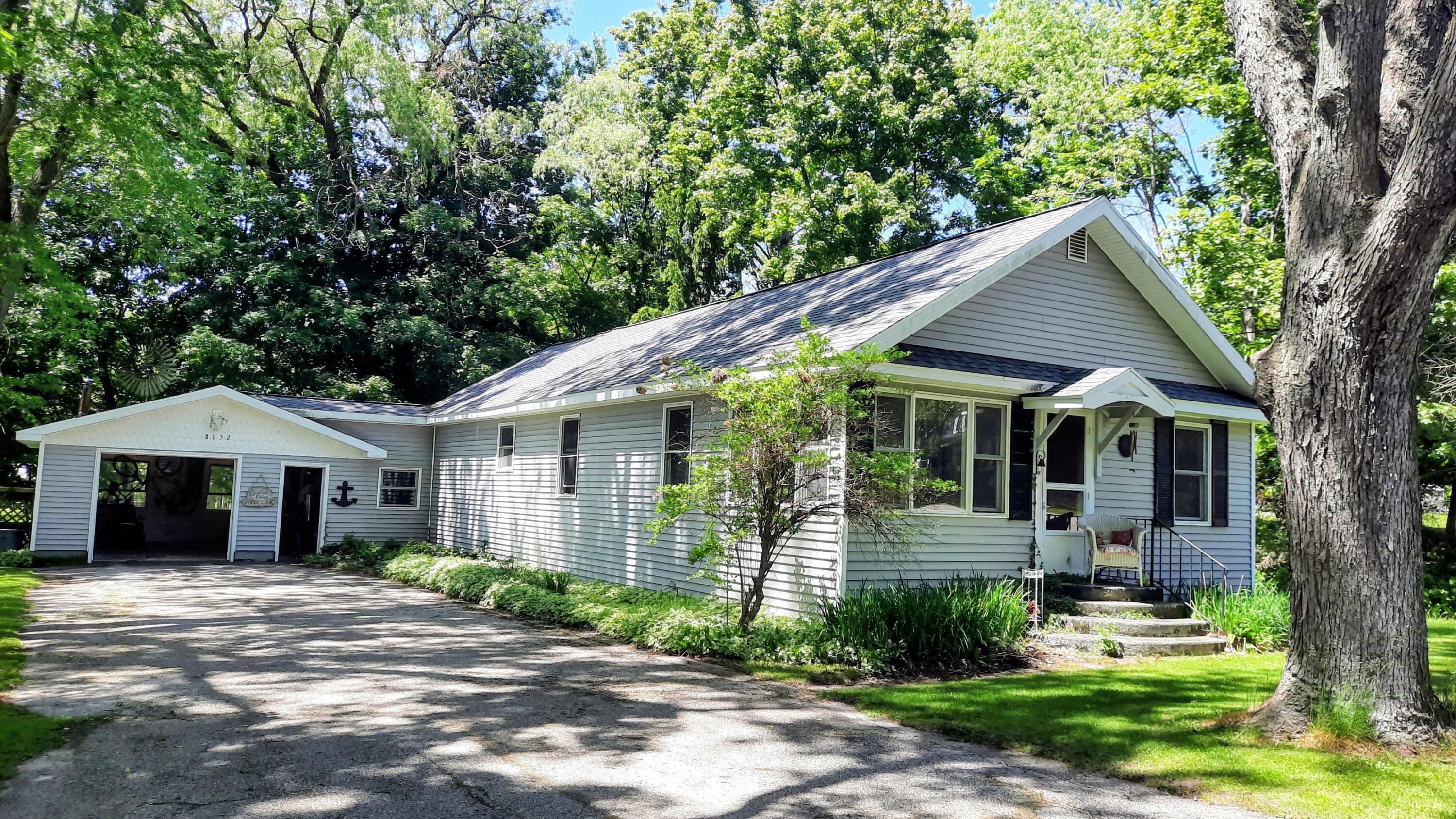 Image 1: Onekama's Brookside Cottage!