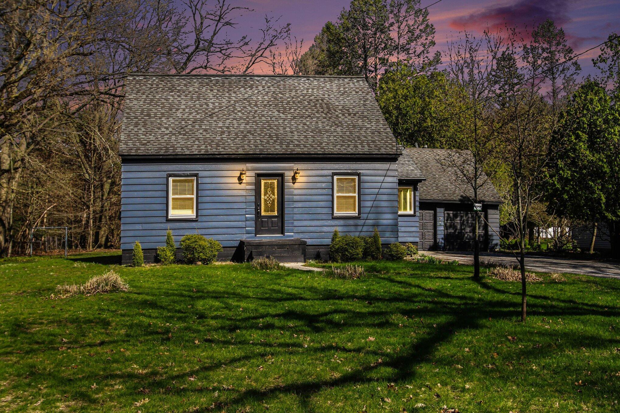 Image 2: Twilight Front of Home