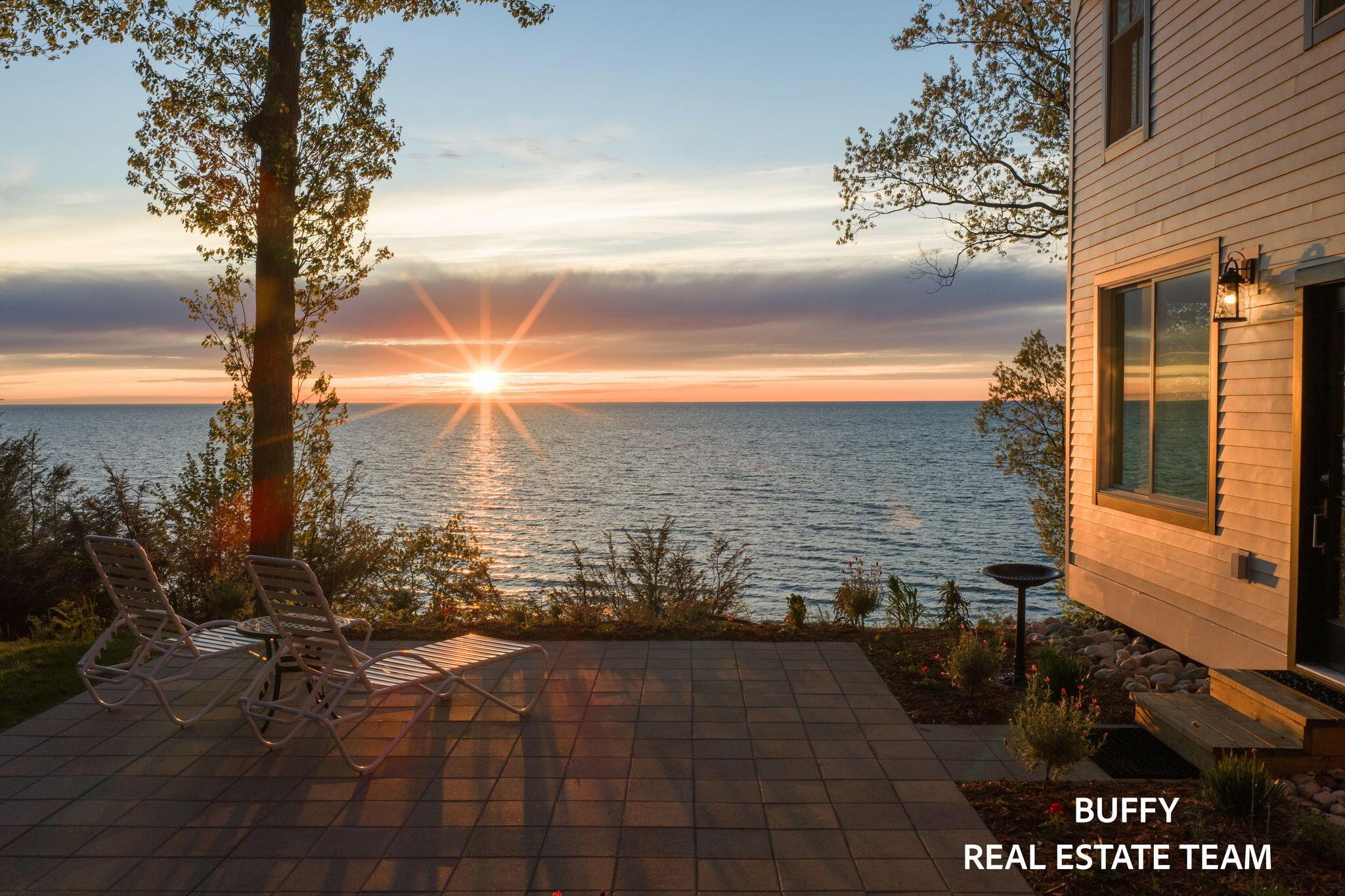 Image 2: Main House Side Patio Sunset View
