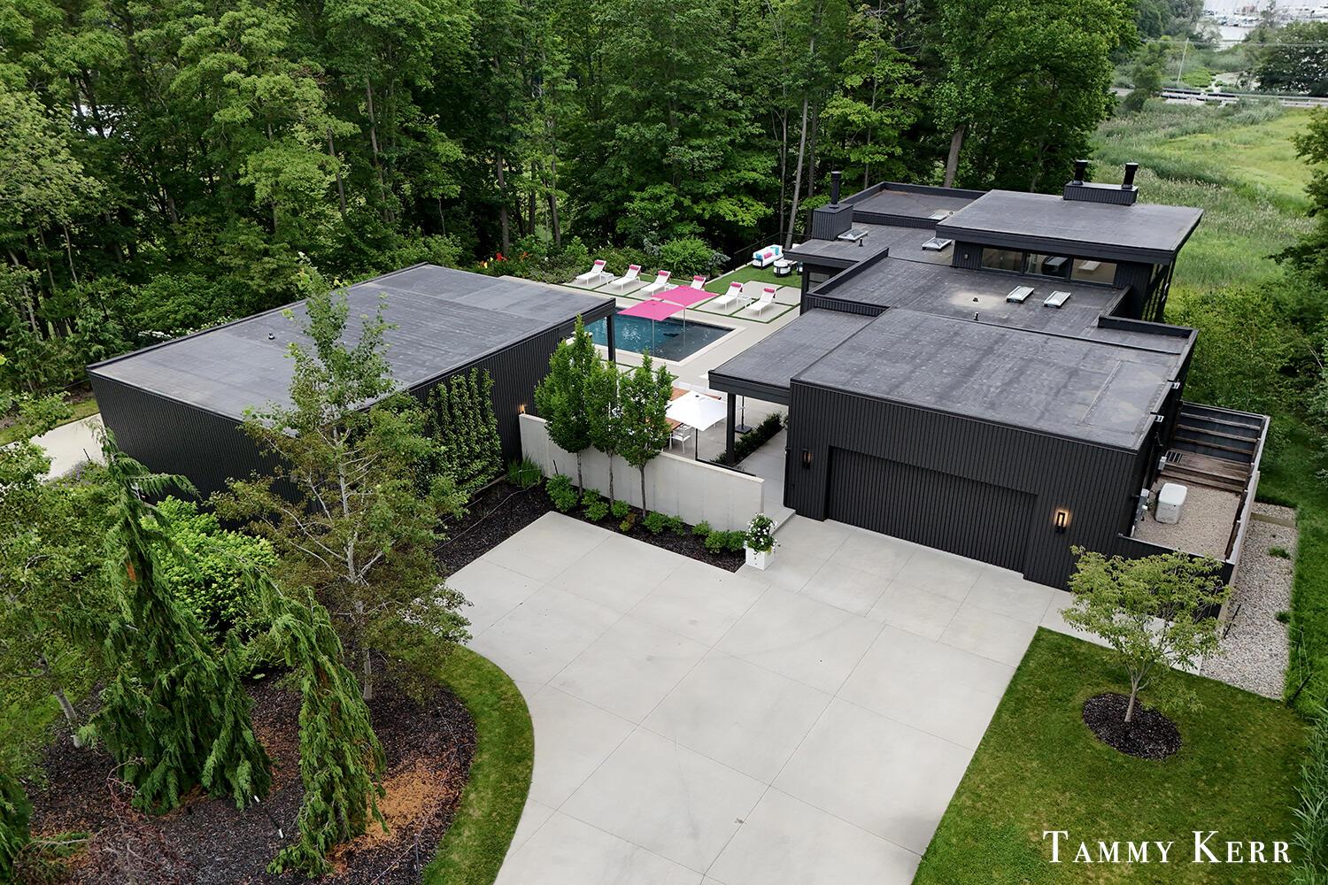 Image 3: 003-702-golfview-drive-aerial-home-and-p