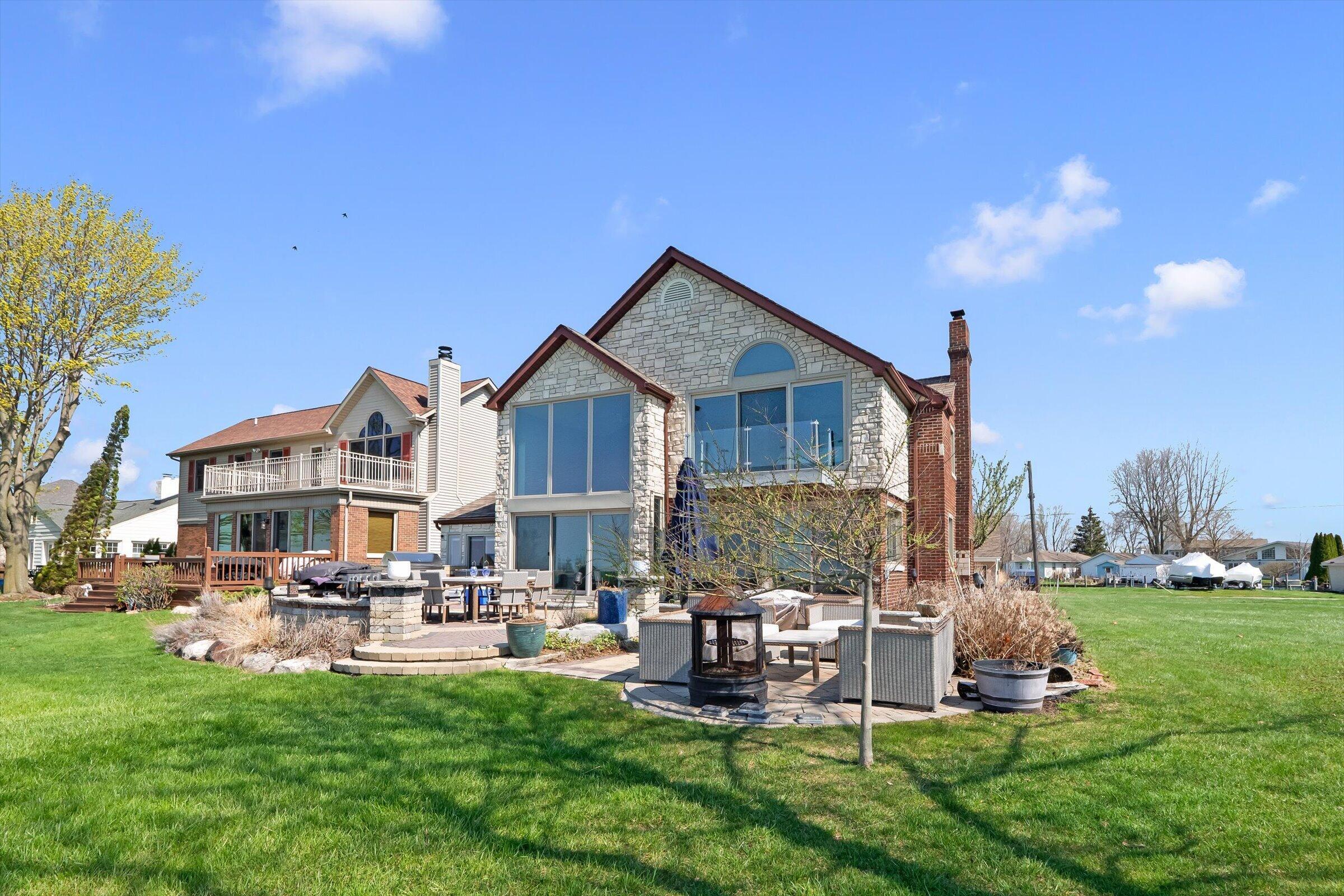 Image 1: view of back of home from right side