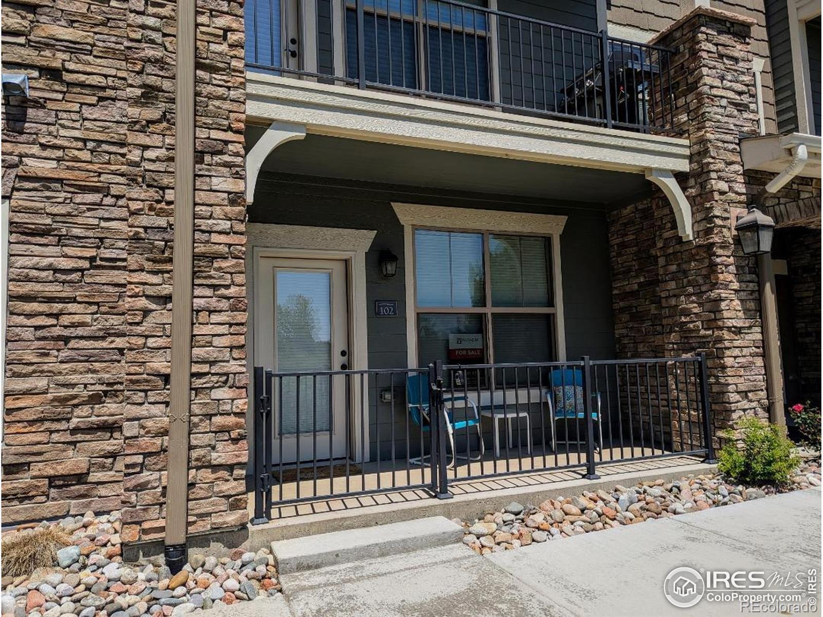 Image 3: Front Porch Area Faces Open Space