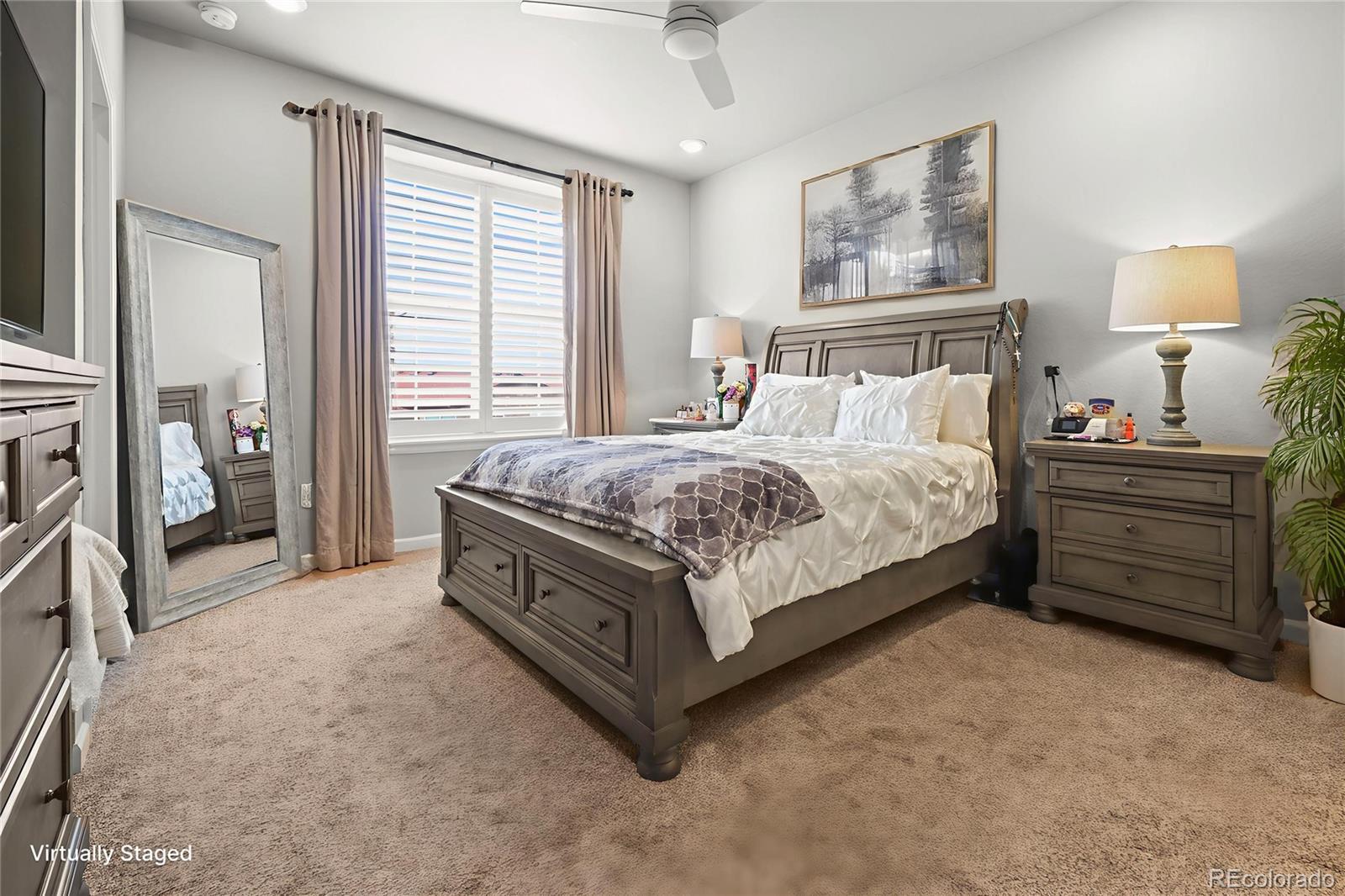 Image 1: Massive primary suite with upgraded ceiling fan