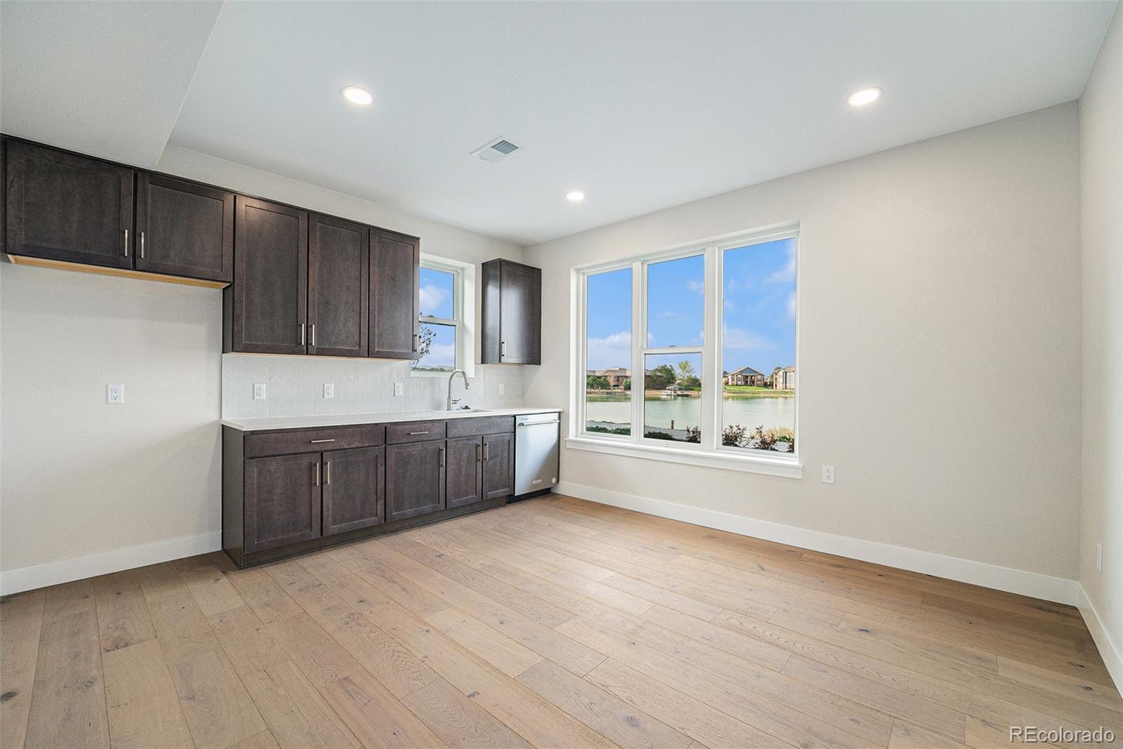 Image 4: First Floor Living Room/Kitchenette