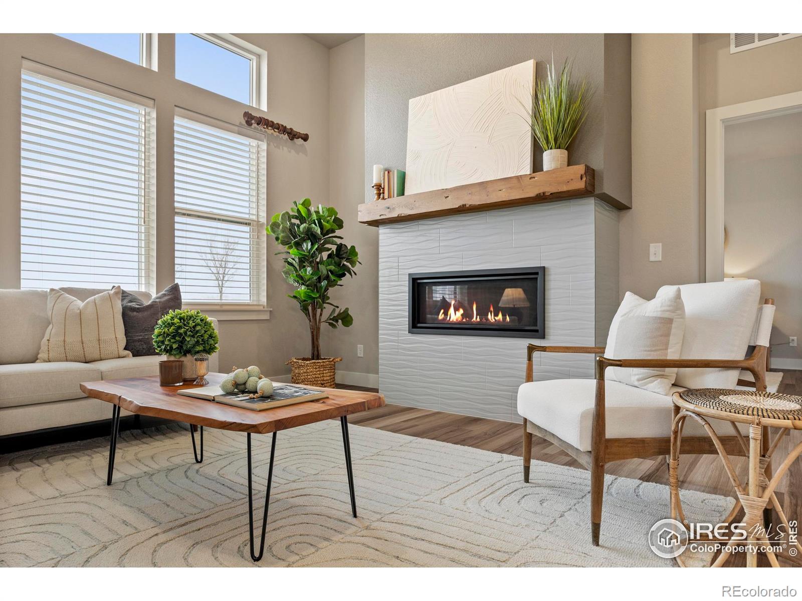 Image 2: Beautiful Finishes & Cozy Living Room