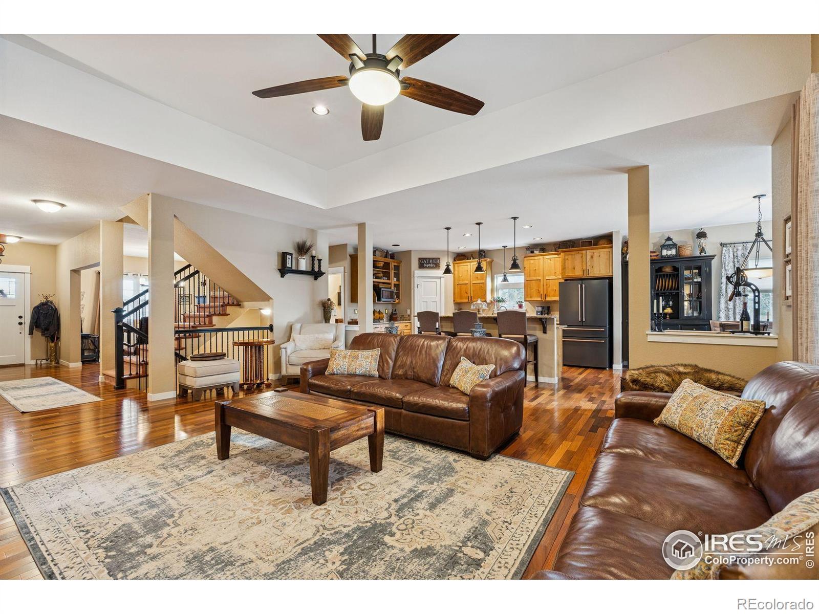 Image 3: Open-concept design perfect for hosting gatherings or just relaxing.