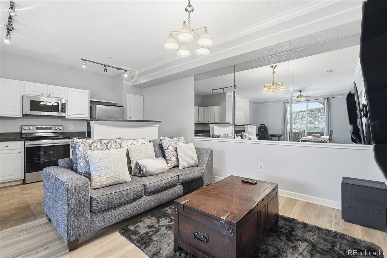 Image 4: Living room & kitchen with hardwood and great light