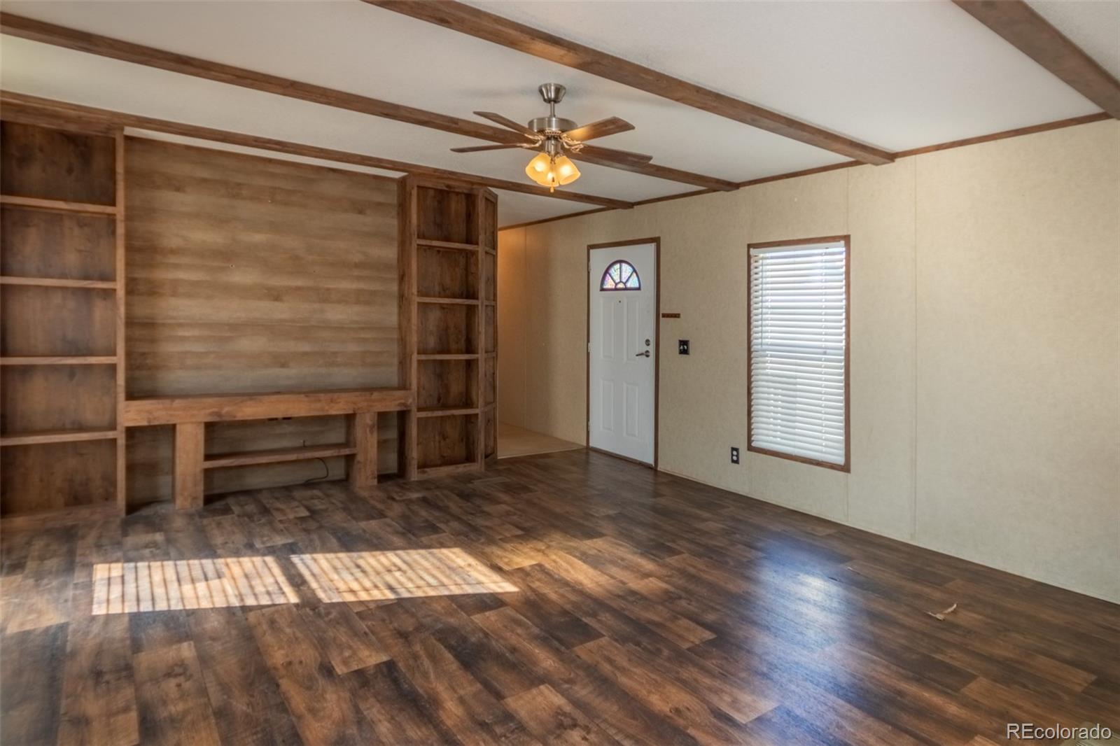 Image 2: Living room with built in shelving. Image 2: Living room with built in shelving.