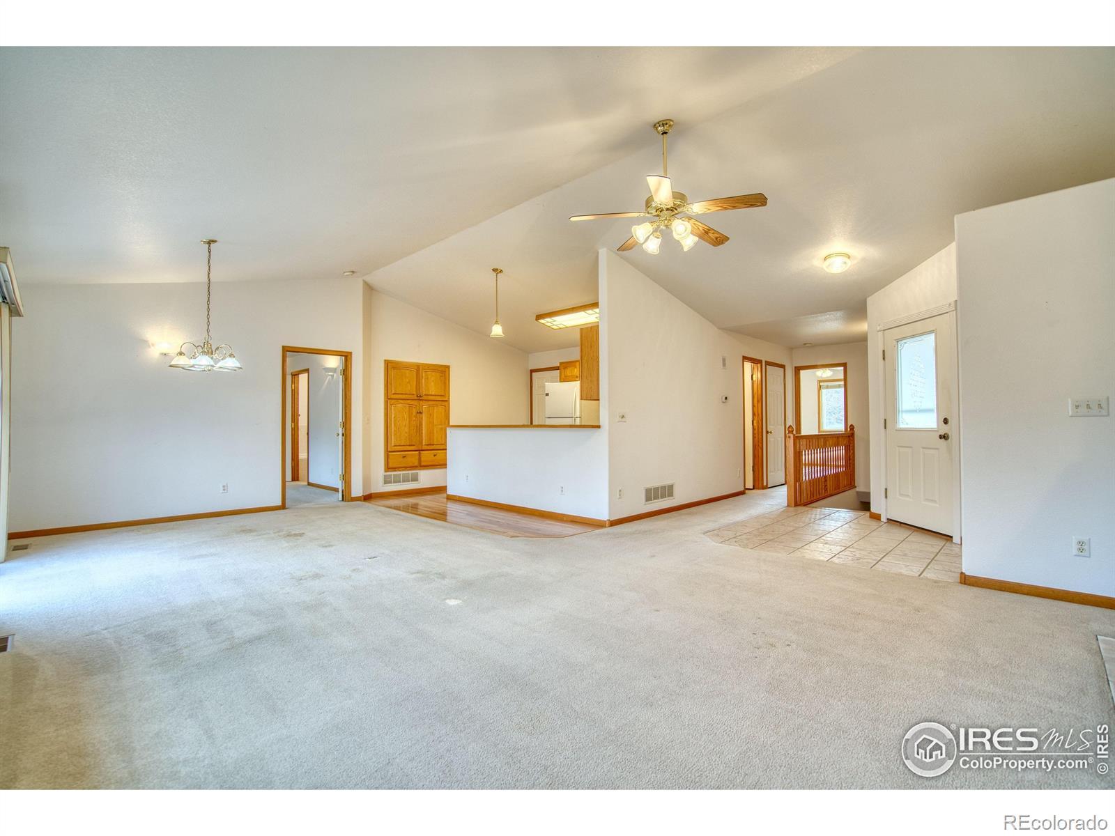 Image 4: Tile entry leads to soaring ceilings and a sunny open floor plan. Image 4: Tile entry leads to soaring ceilings and a sunny open floor plan.