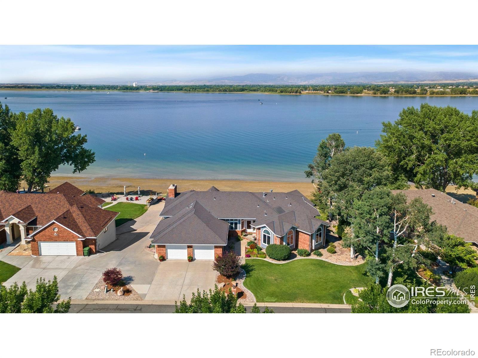 Image 1: Wake up to Sparkling Waters and Majestic Mountain Views