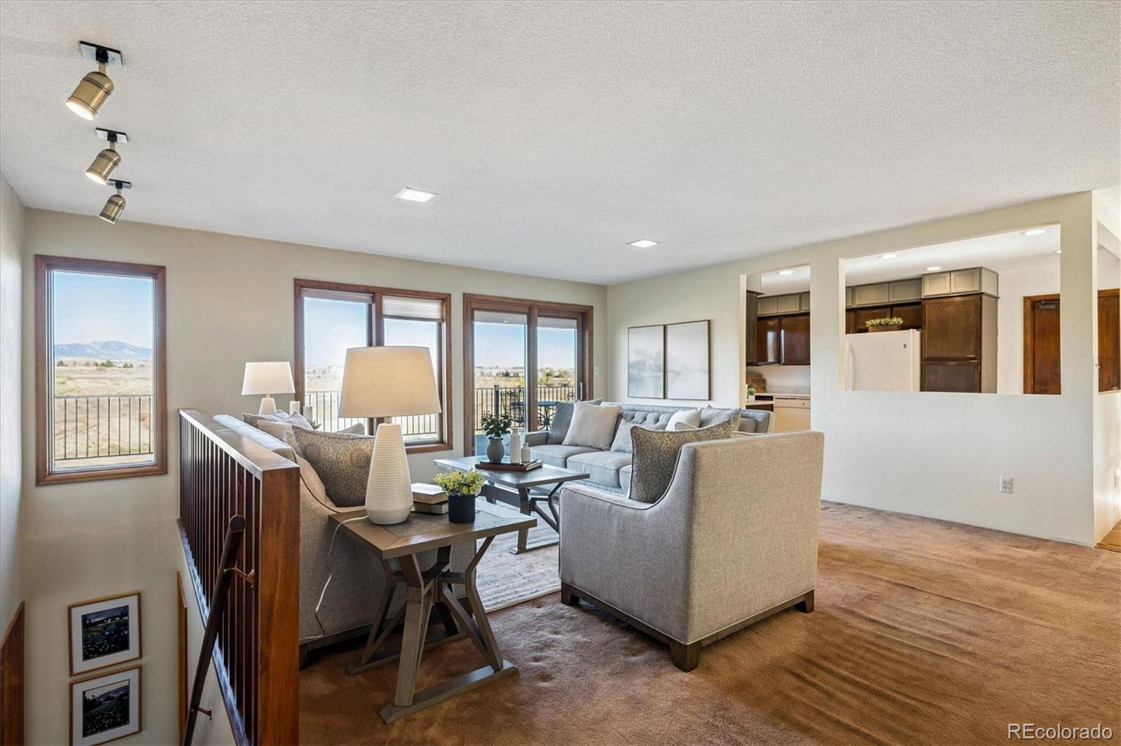 Image 4: Open concept living area with mountain and lake views! Image 4: Open concept living area with mountain and lake views!