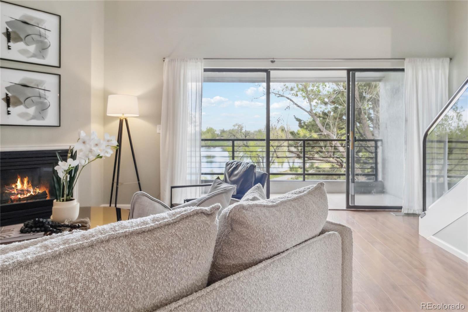 Image 3: Top floor, end unit condo with unobstructed views of Cottonwood Park and Kenderick Lake