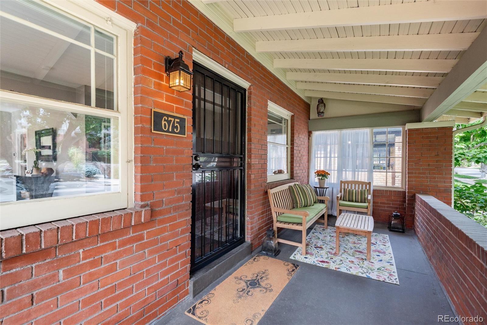 Image 4: Generous covered front porch for outdoor living and entertaining.