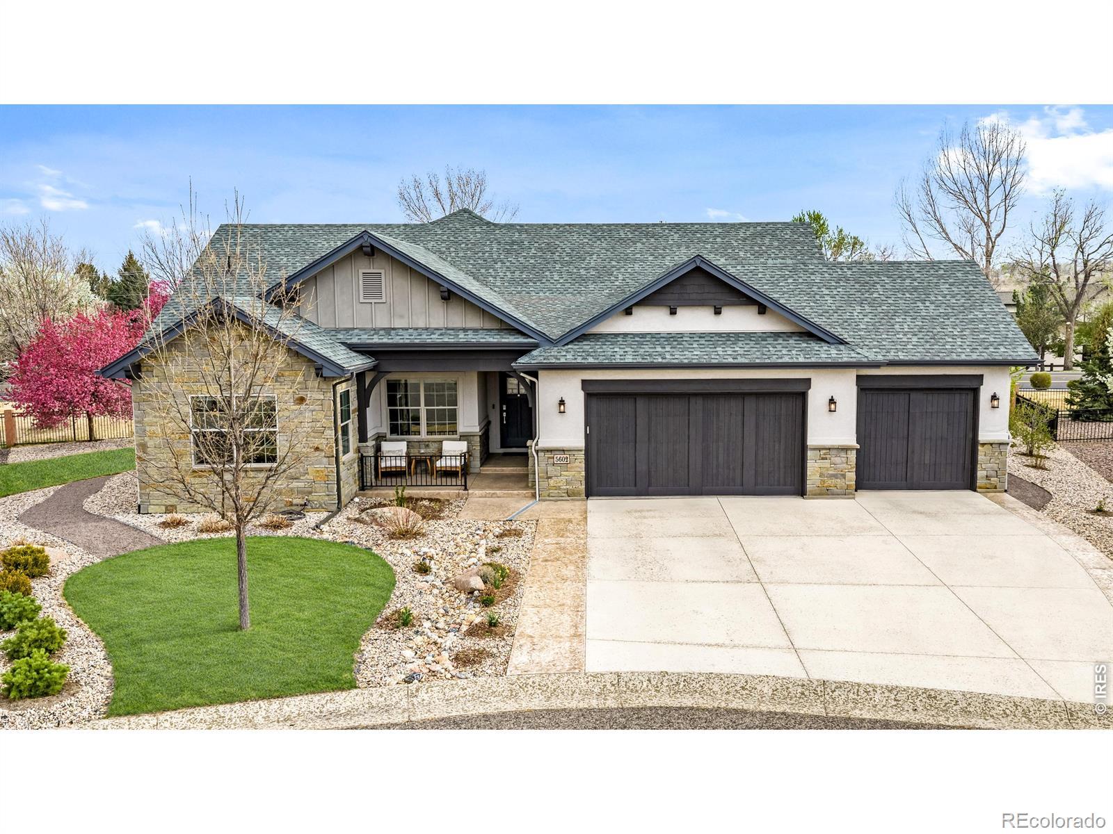 Image 1: Front Exterior: Beautiful front exterior with four-car tandem garage