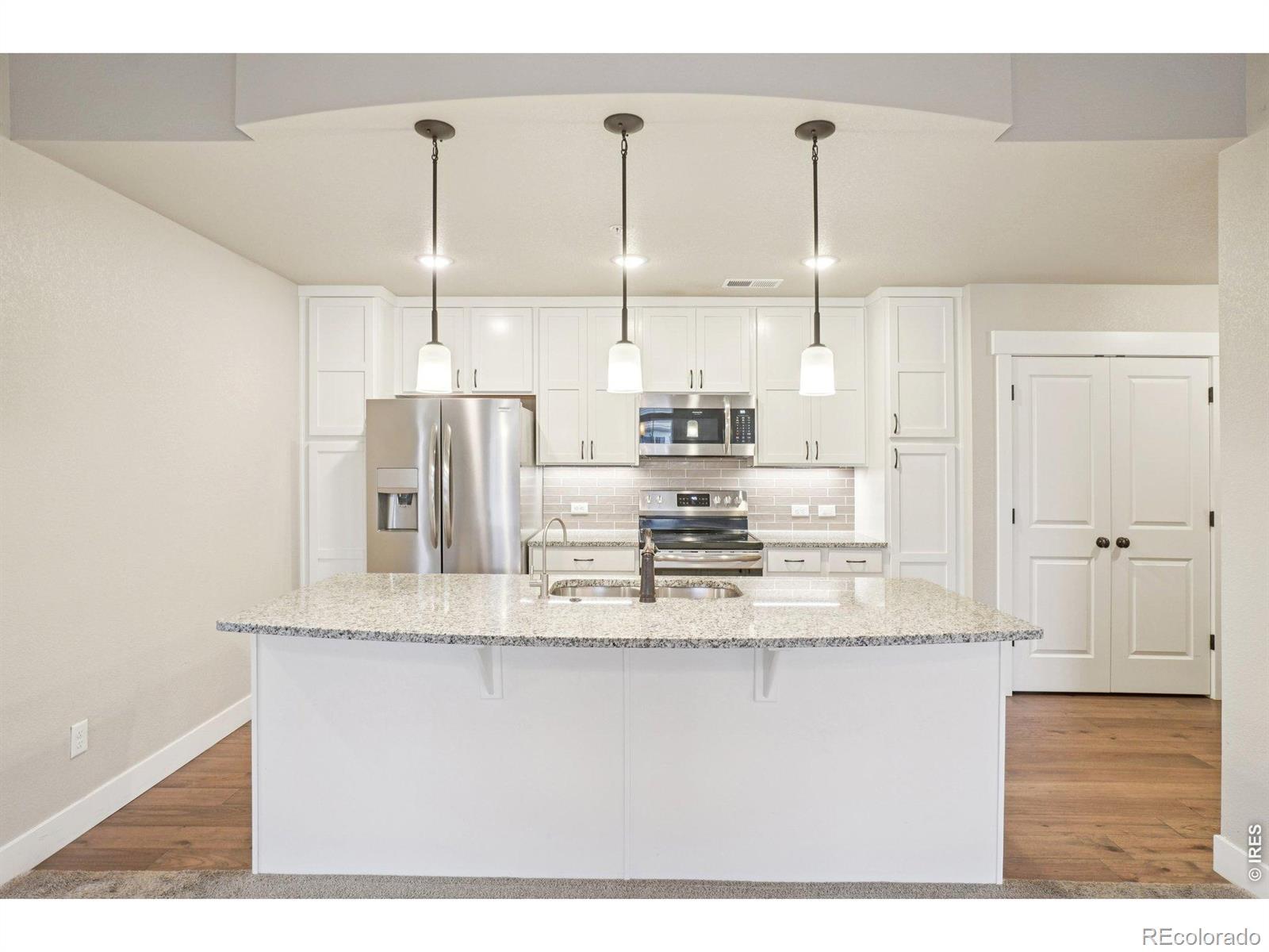 Image 4: Kitchen with Granite Countertops and SS Appliances