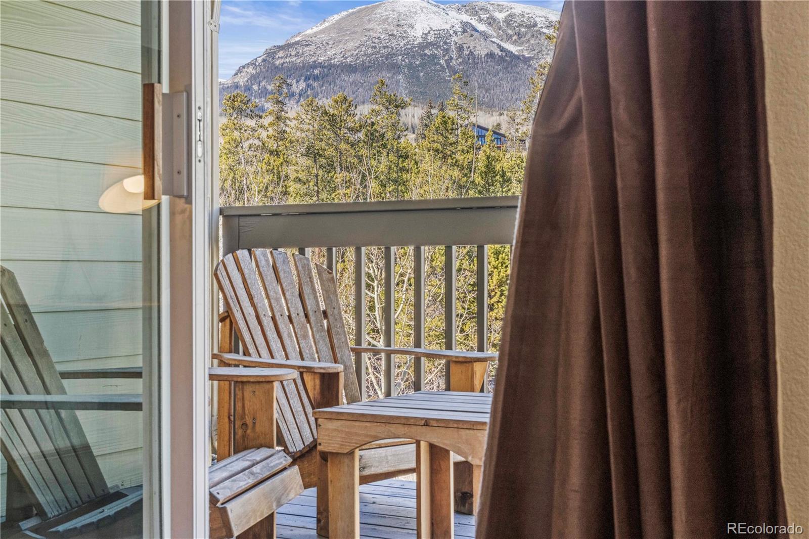 Image 4: North facing covered deck off primary suite Image 4: North facing covered deck off primary suite