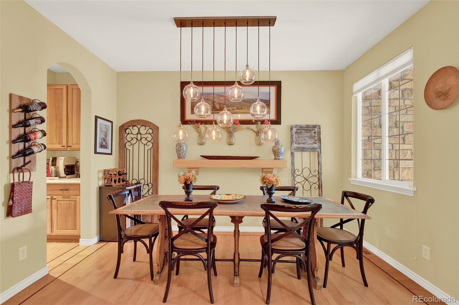Image 4: Formal Dining with Butler Pantry Pass-Through to Kitchen