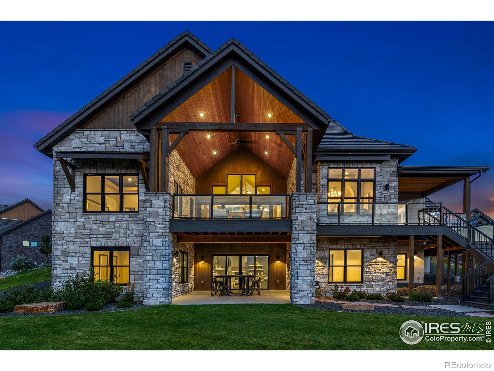 Image 2: An architectural showpiece, this home blends stone, timber, and light into an inviting presence designed for elevated mountain living and unforgettable evenings. Image 2: An architectural showpiece, this home blends stone, timber, and light into an inviting presence designed for elevated mountain living and unforgettable evenings.