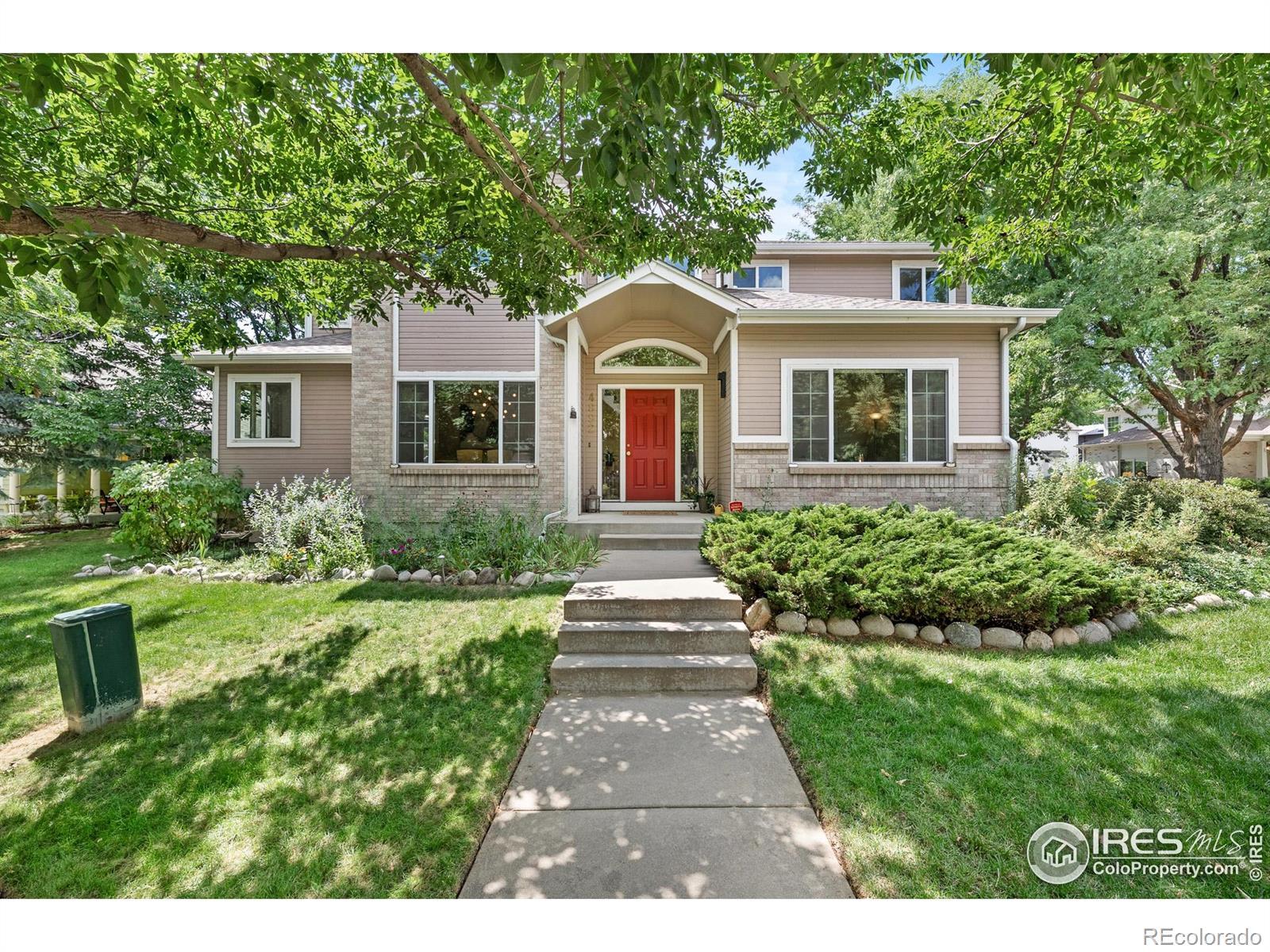 Image 2: With a Main Floor Bed or Office in Boulder, Colorados "Best Kept Secret" Neighborhood, this home sits on a Large Lot with a Neighborhood Friendly Front Yard, a Private Back Yard Oasis in Central Boulder Location and Christensen Park is Just Steps Away