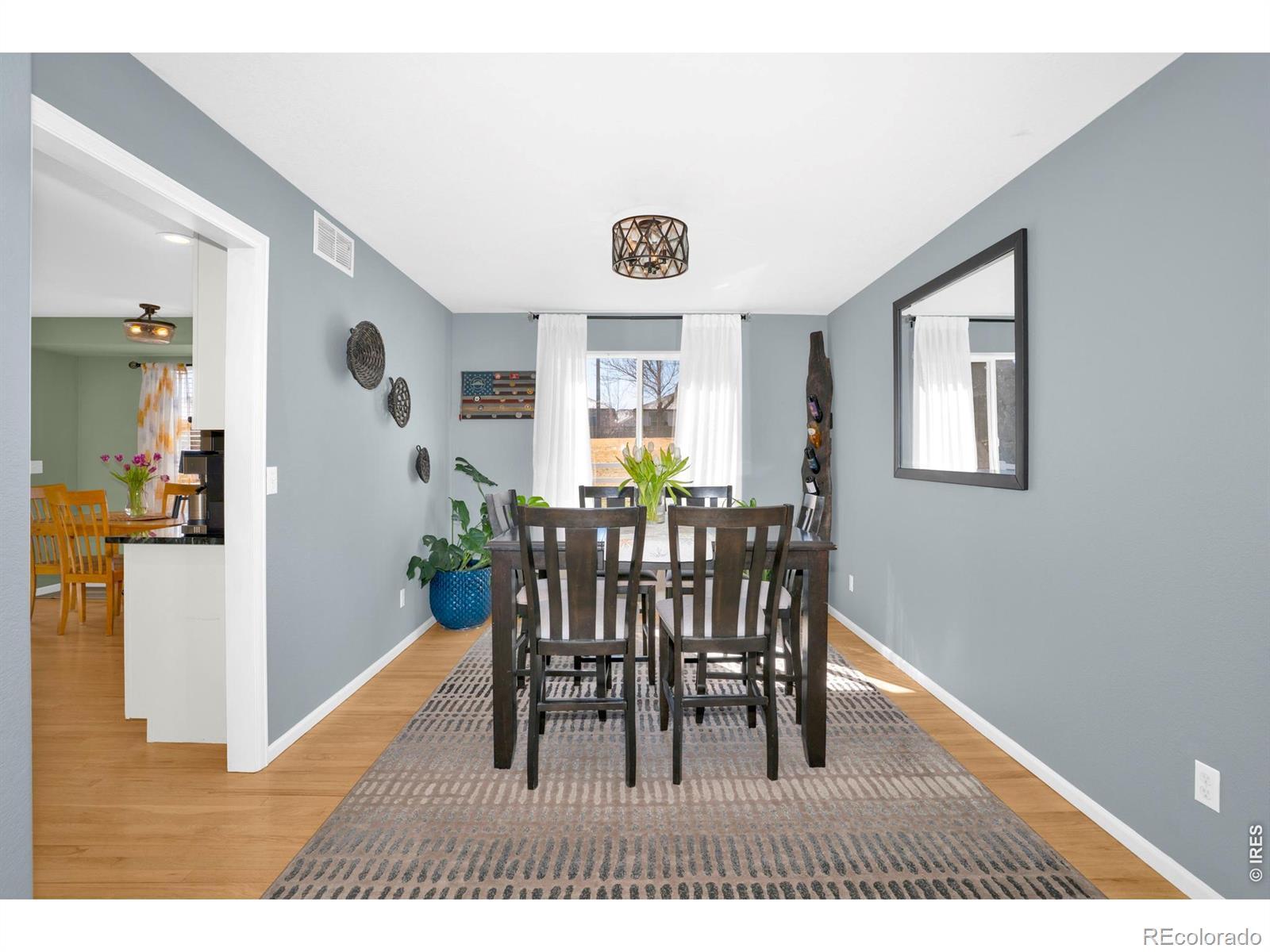 Image 4: Spacious formal dining room can also serve as a flex space!