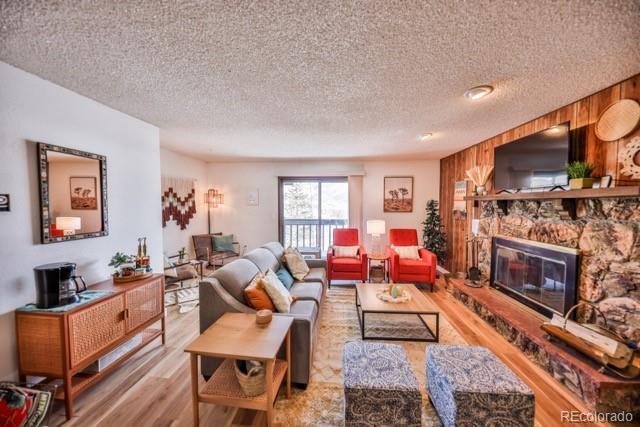 Image 3: Inviting Living area with wood buring fireplace