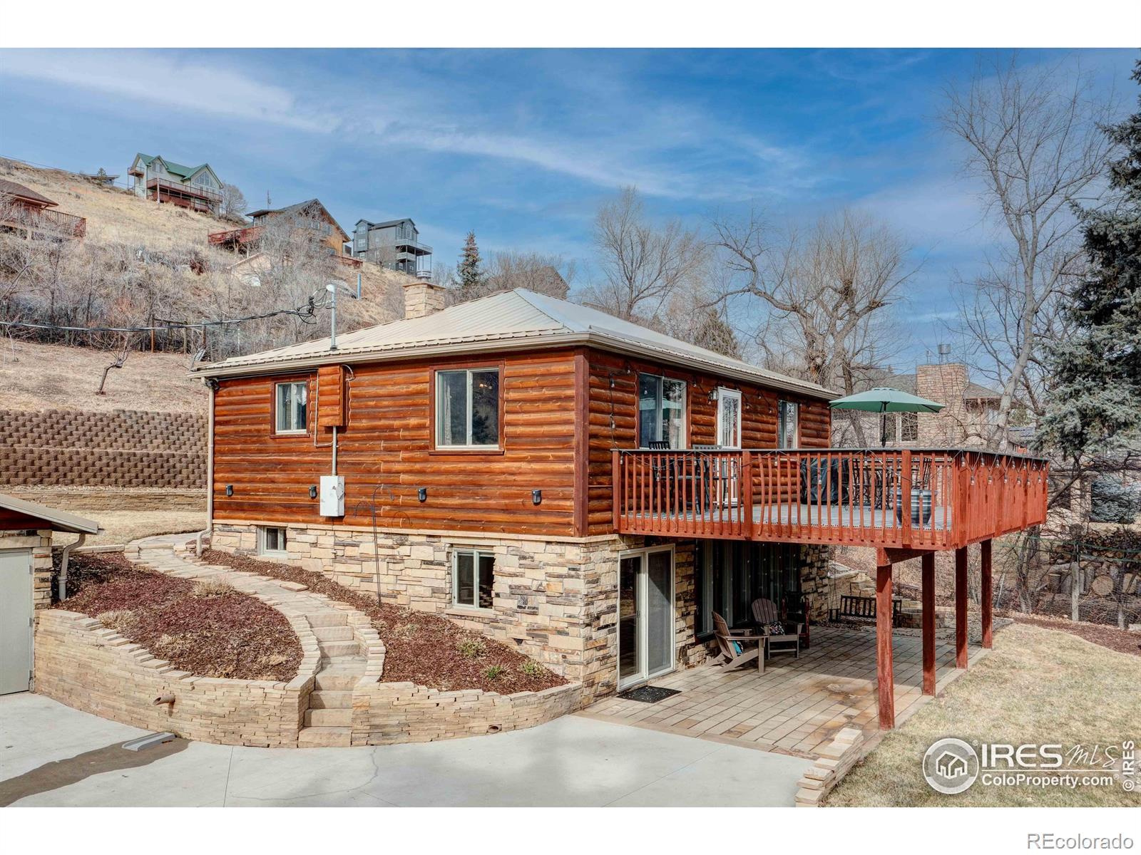 Image 2: Log and stone exterior installed by current owners.
