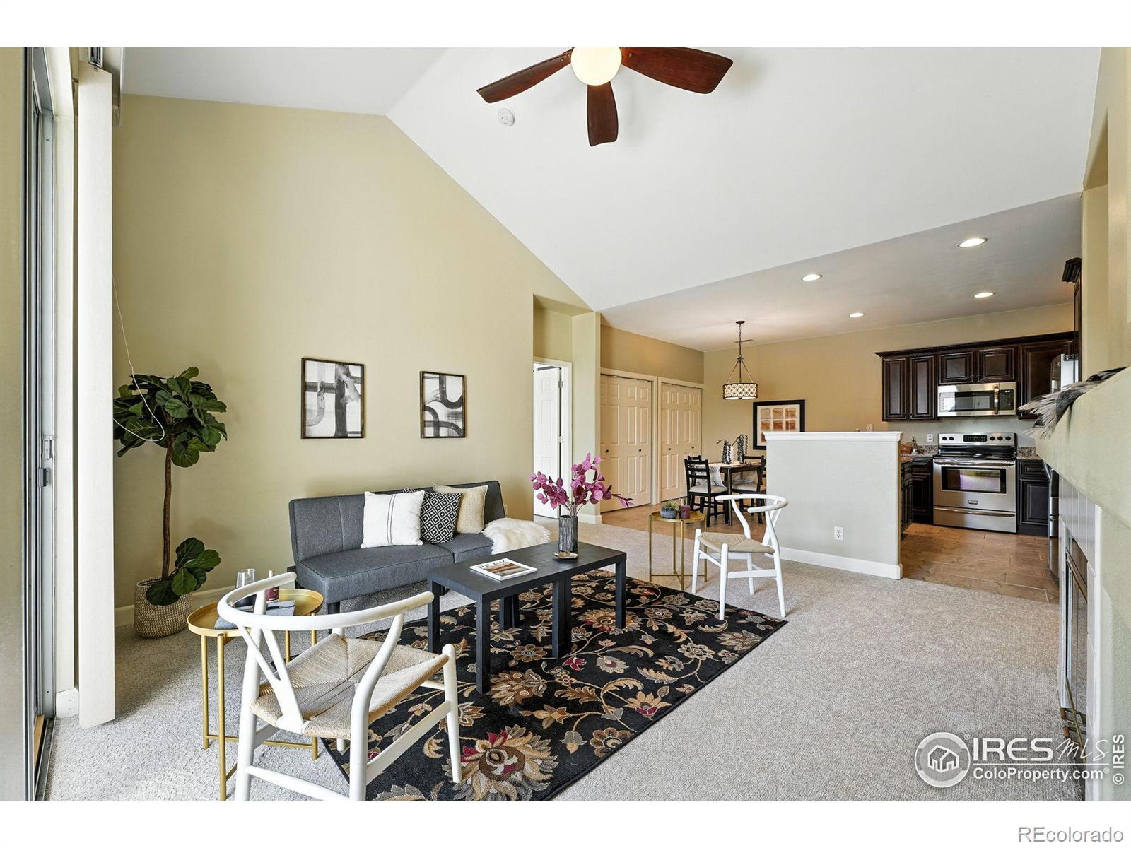 Image 2: Living room into kitchen