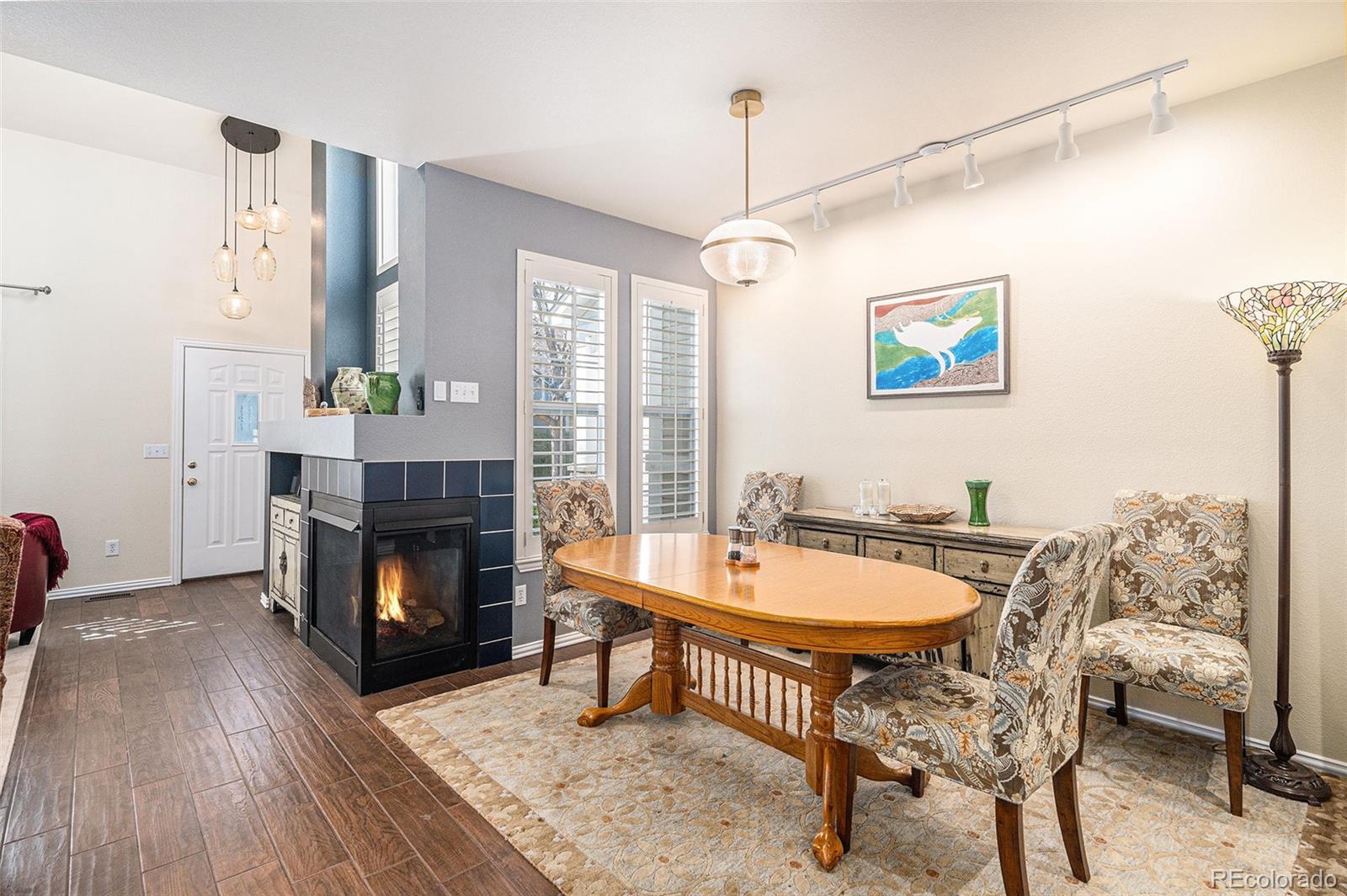 Image 4: Dining room open to both living room and kitchen