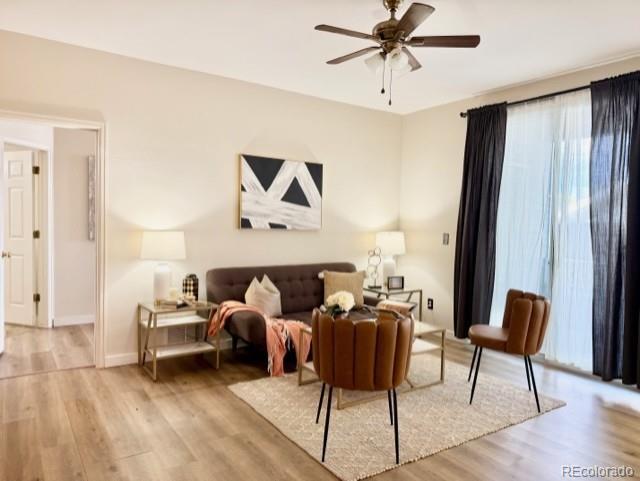 Image 2: Living room adjacent to Primary Bedroom and large Primary Bath.