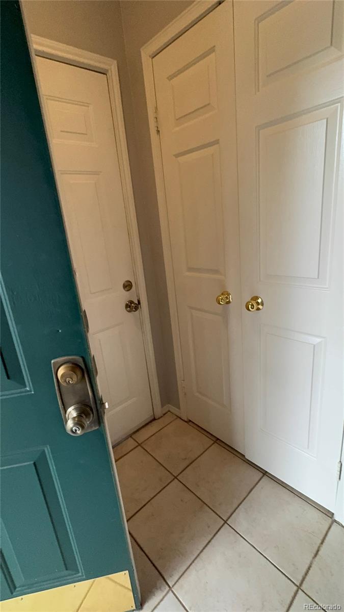 Image 3: Entry way with closet space leading to attached garage&hellip;