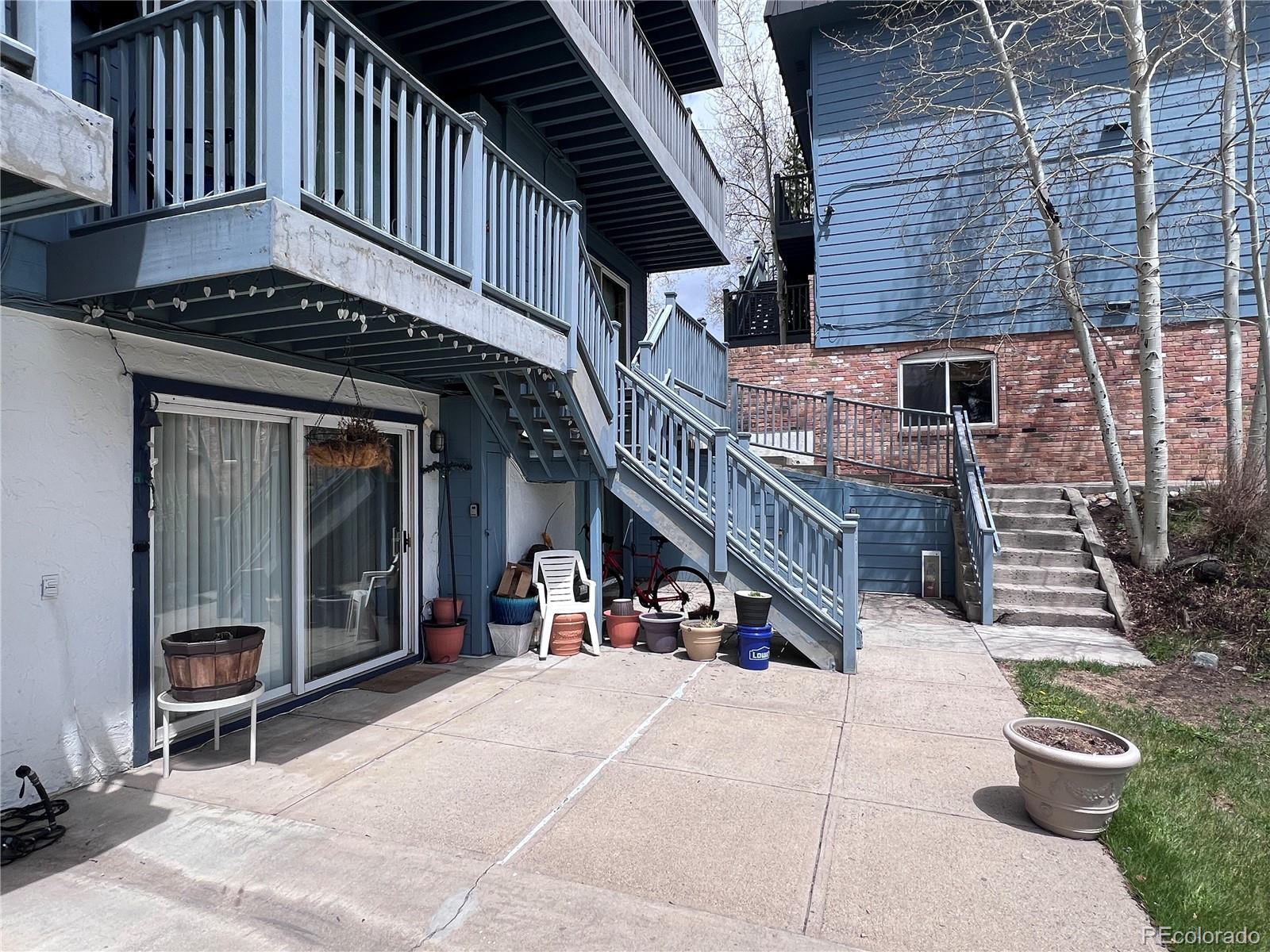 Image 2: Large patio area stretching out to the community lawn Image 2: Large patio area stretching out to the community lawn