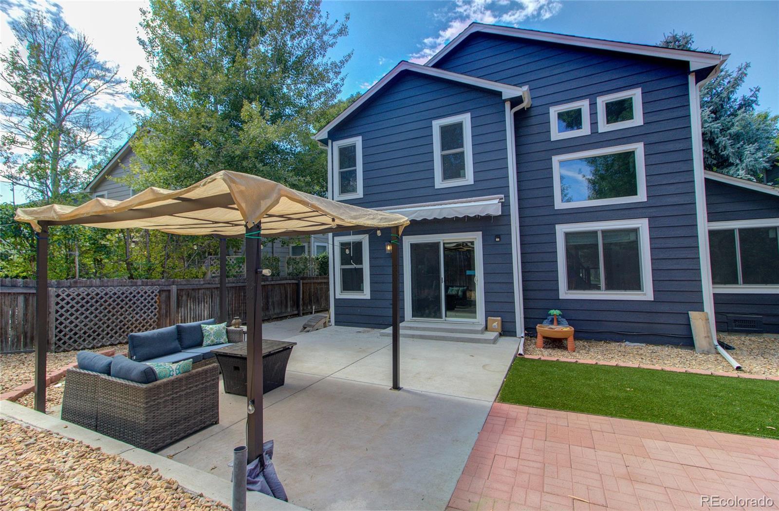 Image 2: Enjoy good times and relaxing times in this beautiful low-maintenance backyard