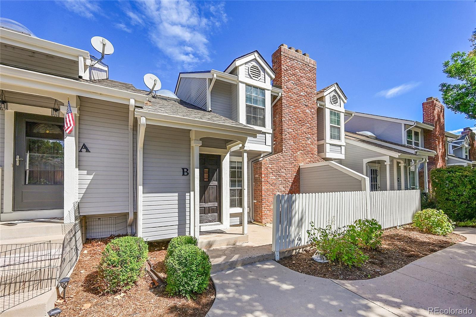 Image 2: Front with Patio Area Image 2: Front with Patio Area