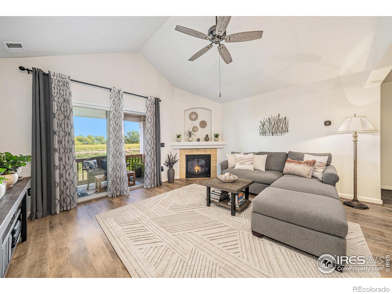 Image 3: Living Room w/ Fireplace & Access to Balcony Image 3: Living Room w/ Fireplace & Access to Balcony