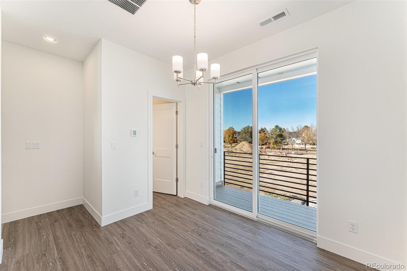 Image 4: Guest half bath on elevated main level