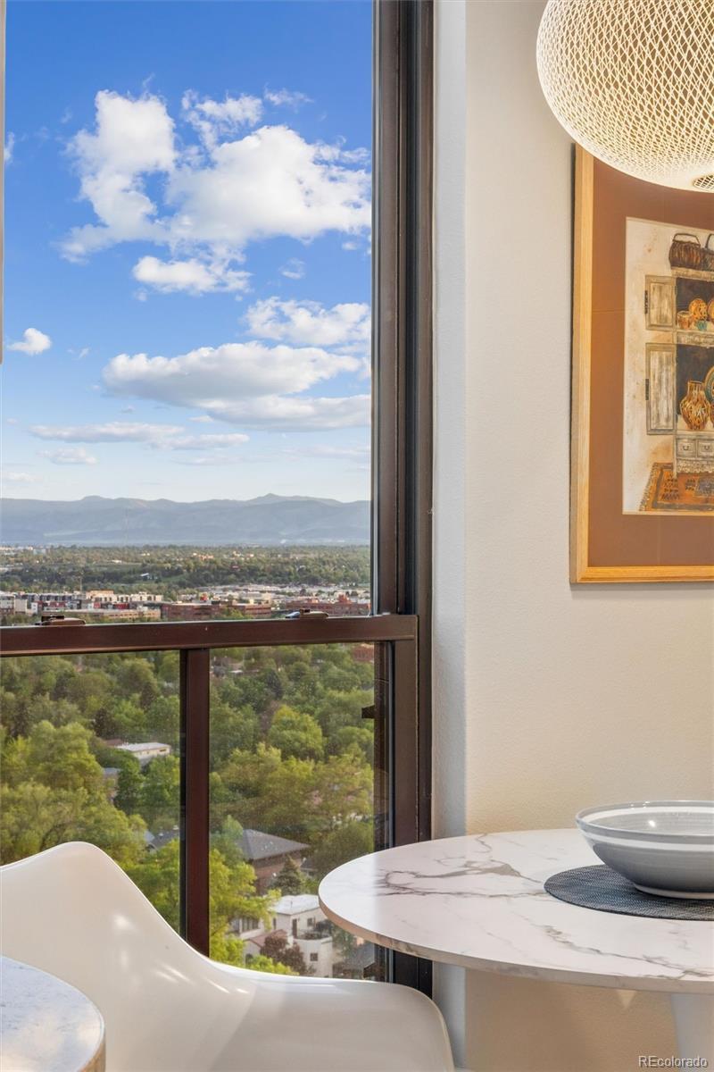Image 3: Light-filled eat-in nook with mountain views. Image 3: Light-filled eat-in nook with mountain views.
