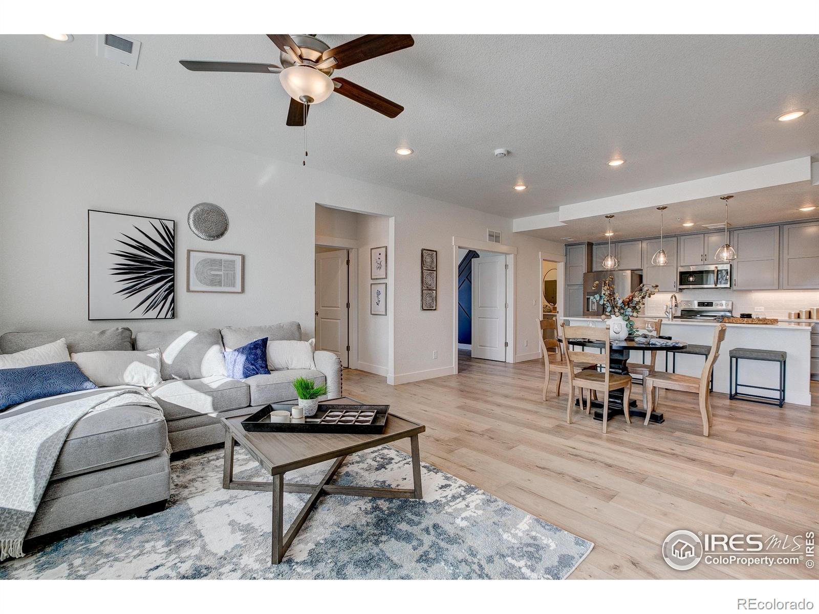 Image 2: Spacious, inviting living, dining, and kitchen