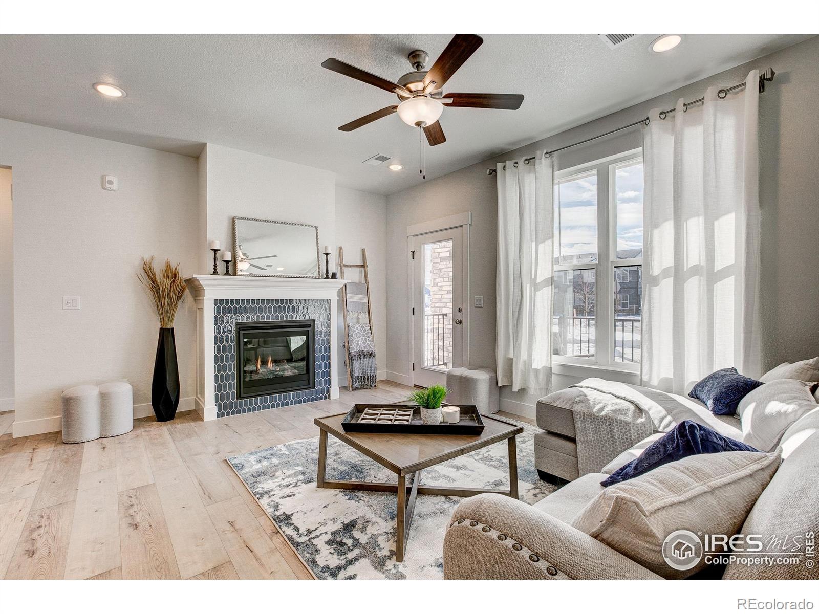 Image 4: Cozy up on winter nights w/ your built-in fireplace, or cool off w/ your included ceiling fan.