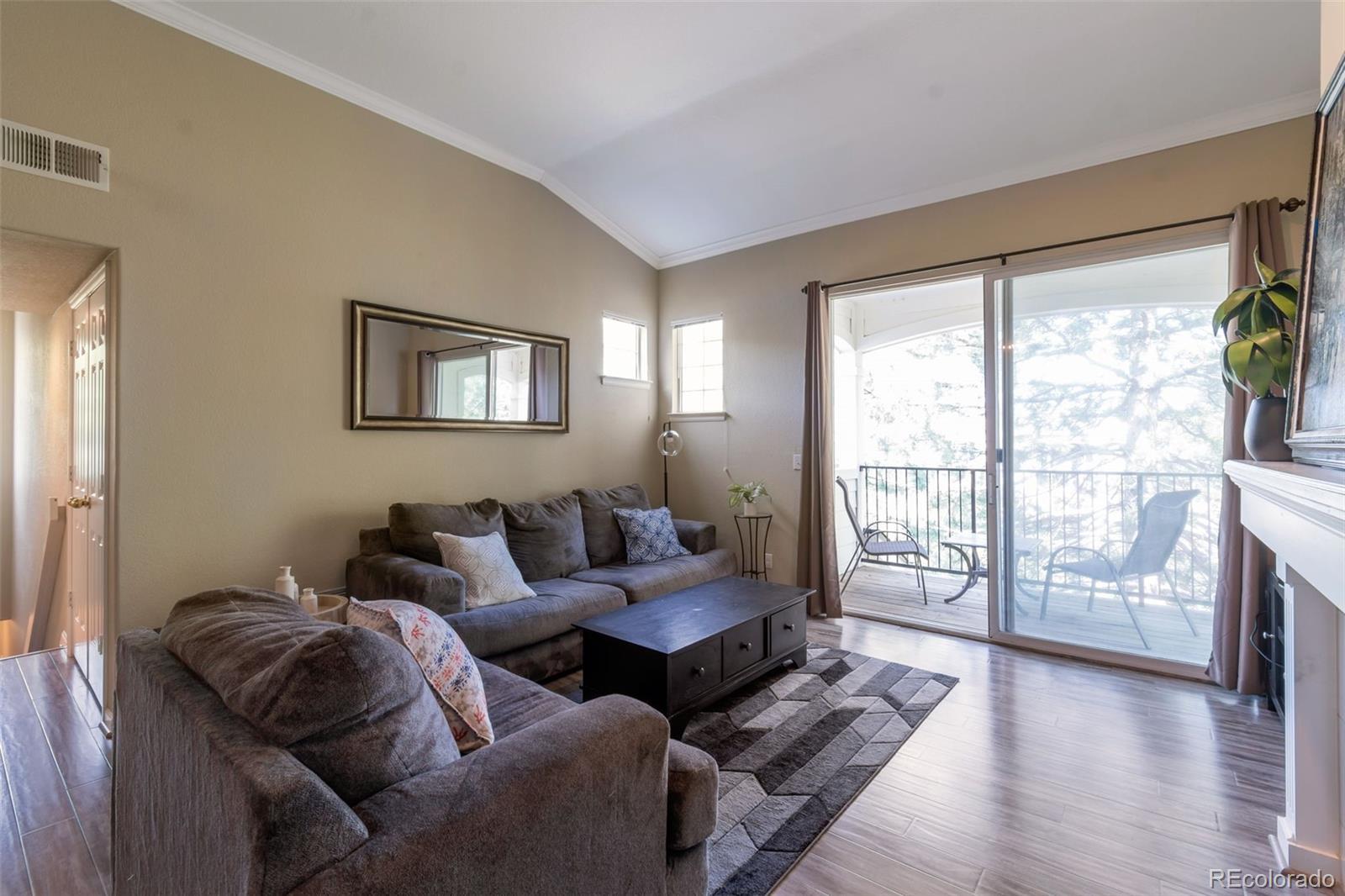 Image 3: Large glass doors with lots of light and balcony.
